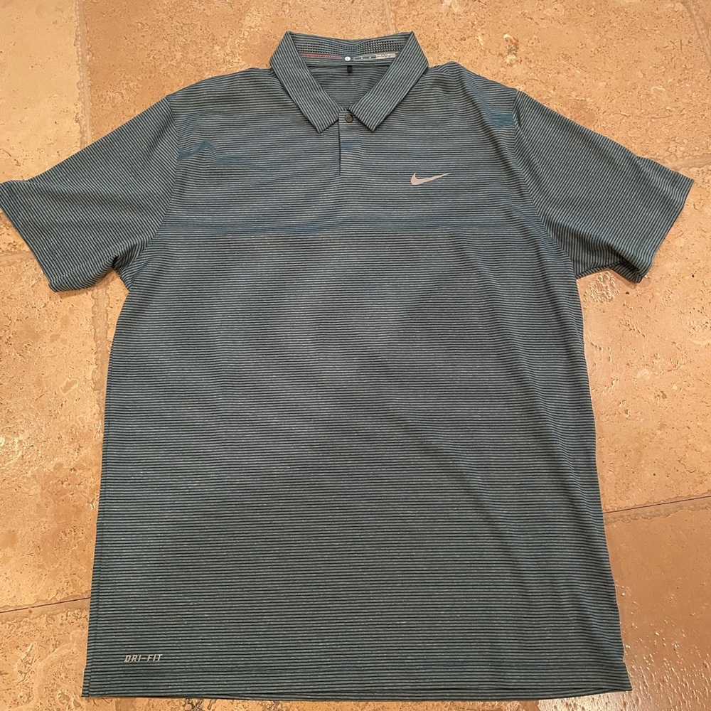 Size L, Tiger Woods collection polo. Worn once. Like-new condition.